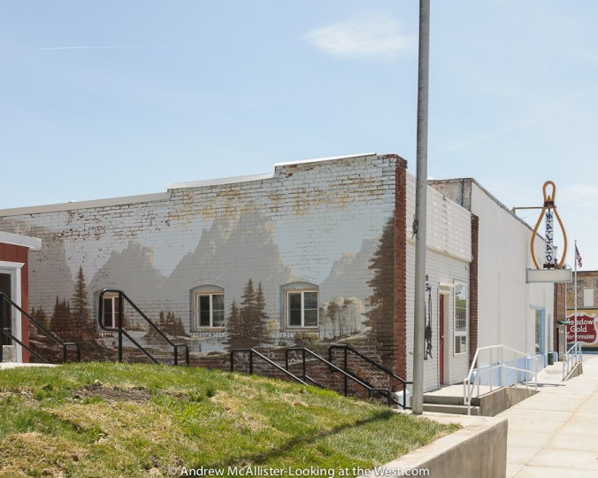 Western mural painted on the side of a bowling alley in Malad, Idaho